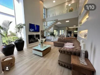 Foto Casa com 4 Dormitórios