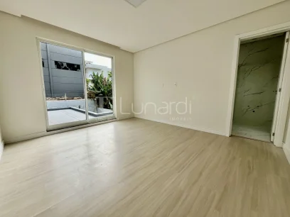 Foto Casa com 3 Suítes
