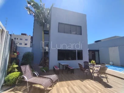 Foto Casa com 3 Dormitórios