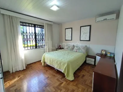 Foto Casa com 3 Dormitórios