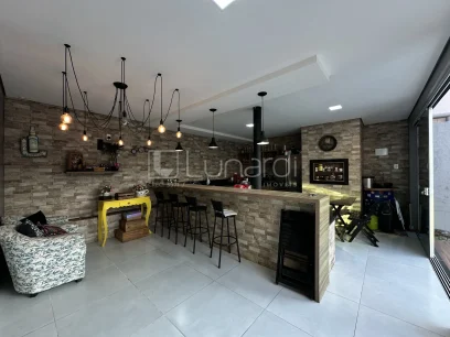 Foto Casa com 4 Dormitórios