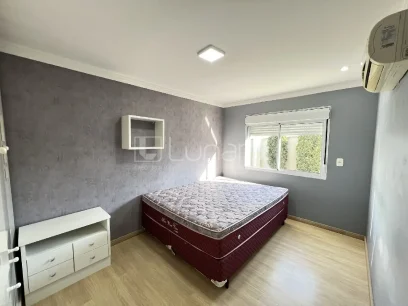 Foto Casa com 4 Dormitórios