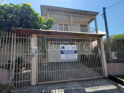Foto Casa com 4 Dormitórios