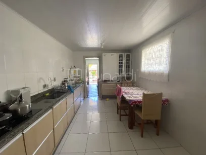 Foto Casa com 3 Dormitórios