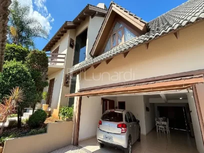 Foto Casa com 4 Dormitórios