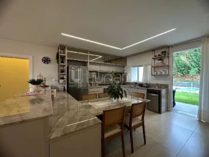 Foto Casa com 3 Suítes