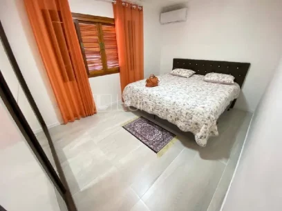 Foto Casa com 3 Dormitórios