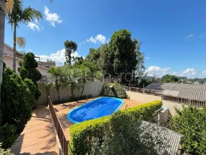 Foto Casa com 4 Dormitórios