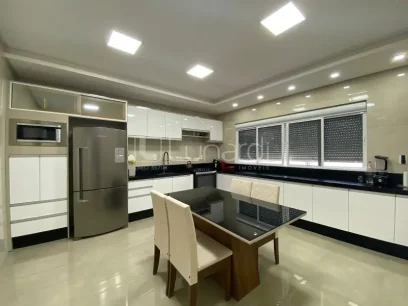 Foto Casa com 3 Suítes