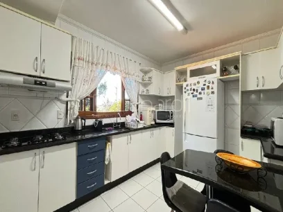 Foto Casa com 4 Dormitórios