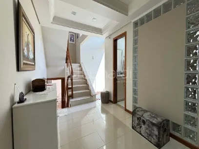 Foto Casa com 4 Dormitórios