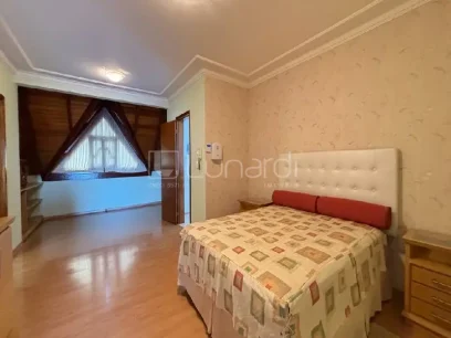 Foto Casa com 4 Dormitórios