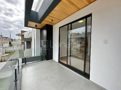 Foto Casa com 3 Suítes