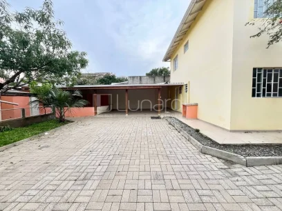 Foto Casa com 4 Dormitórios