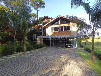 Foto Casa com 4 Dormitórios