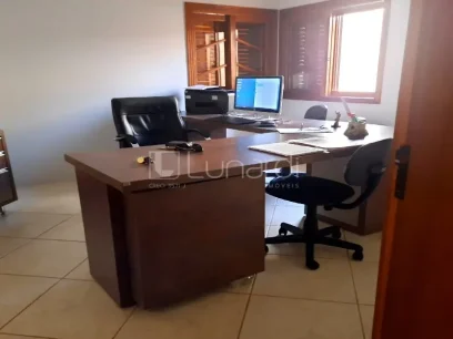 Foto Casa com 4 Dormitórios