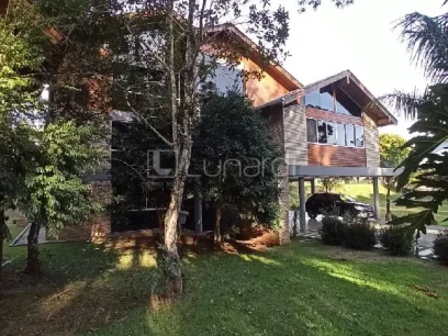 Foto Casa com 4 Dormitórios