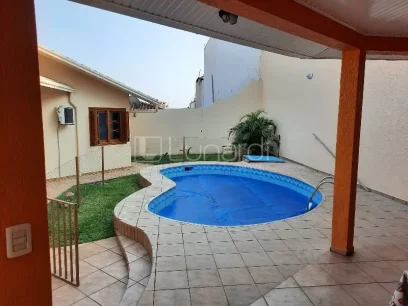 Foto Casa com 4 Dormitórios