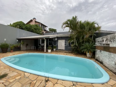 Foto Casa com 3 Dormitórios
