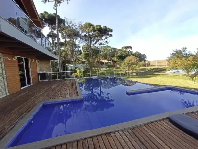 Foto Casa com 4 Dormitórios