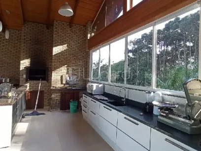 Foto Casa com 4 Dormitórios