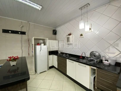 Foto Casa com 3 Dormitórios
