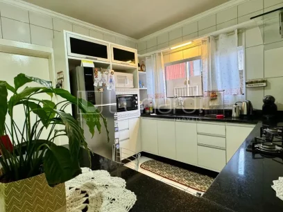 Foto Casa com 3 Dormitórios