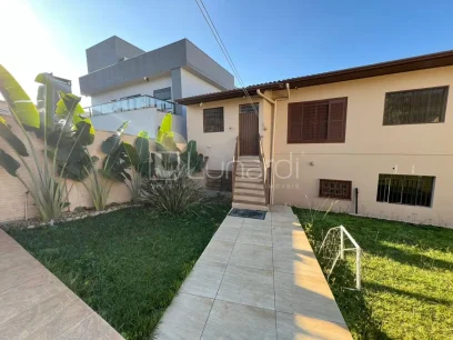 Foto Casa com 4 Dormitórios