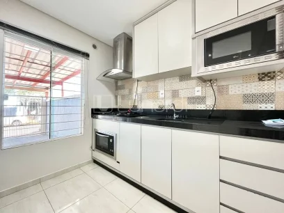 Foto Casa com 3 Dormitórios