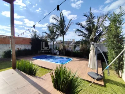 Foto Casa com 3 Dormitórios