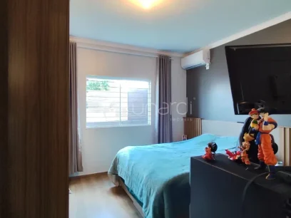 Foto Casa com 3 Dormitórios