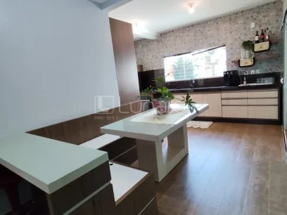 Foto Casa com 3 Dormitórios
