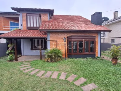 Foto Casa com 3 Dormitórios