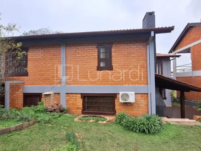 Foto Casa com 3 Dormitórios