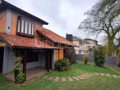 Foto Casa com 3 Dormitórios