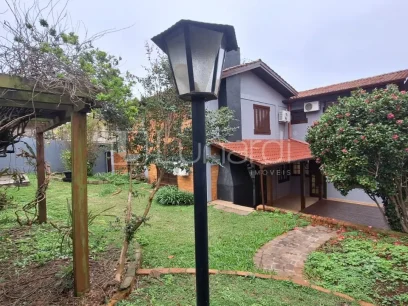 Foto Casa com 3 Dormitórios