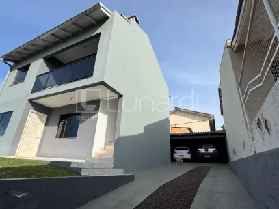 Foto Casa com 4 Dormitórios