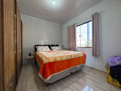 Foto Casa com 4 Dormitórios