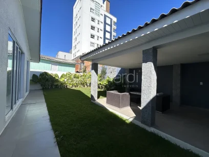 Foto Casa com 4 Dormitórios