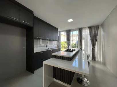Foto Casa com 4 Dormitórios