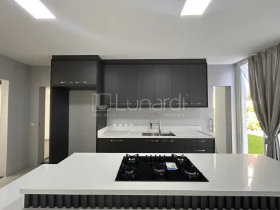 Foto Casa com 4 Dormitórios
