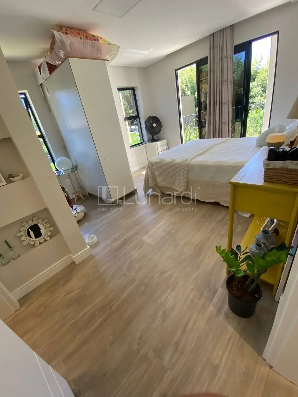 Foto Casa com 4 Dormitórios