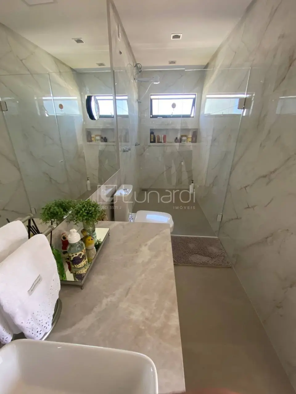 Foto Casa com 4 Dormitórios