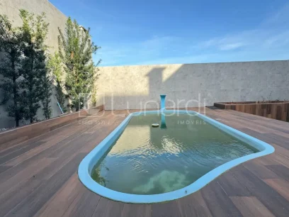 Foto Casa com 4 Dormitórios