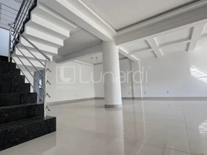 Foto Casa com 4 Dormitórios