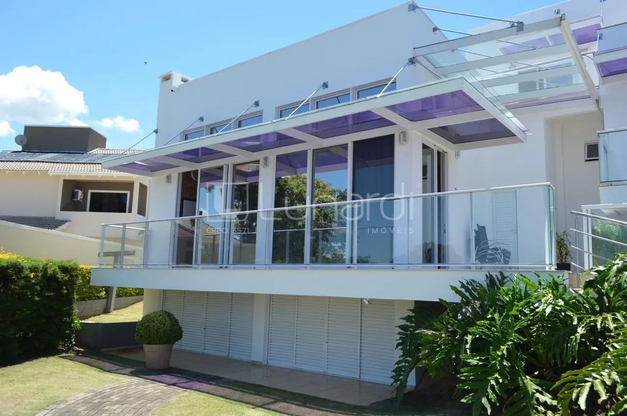 Foto Casa com 4 Dormitórios