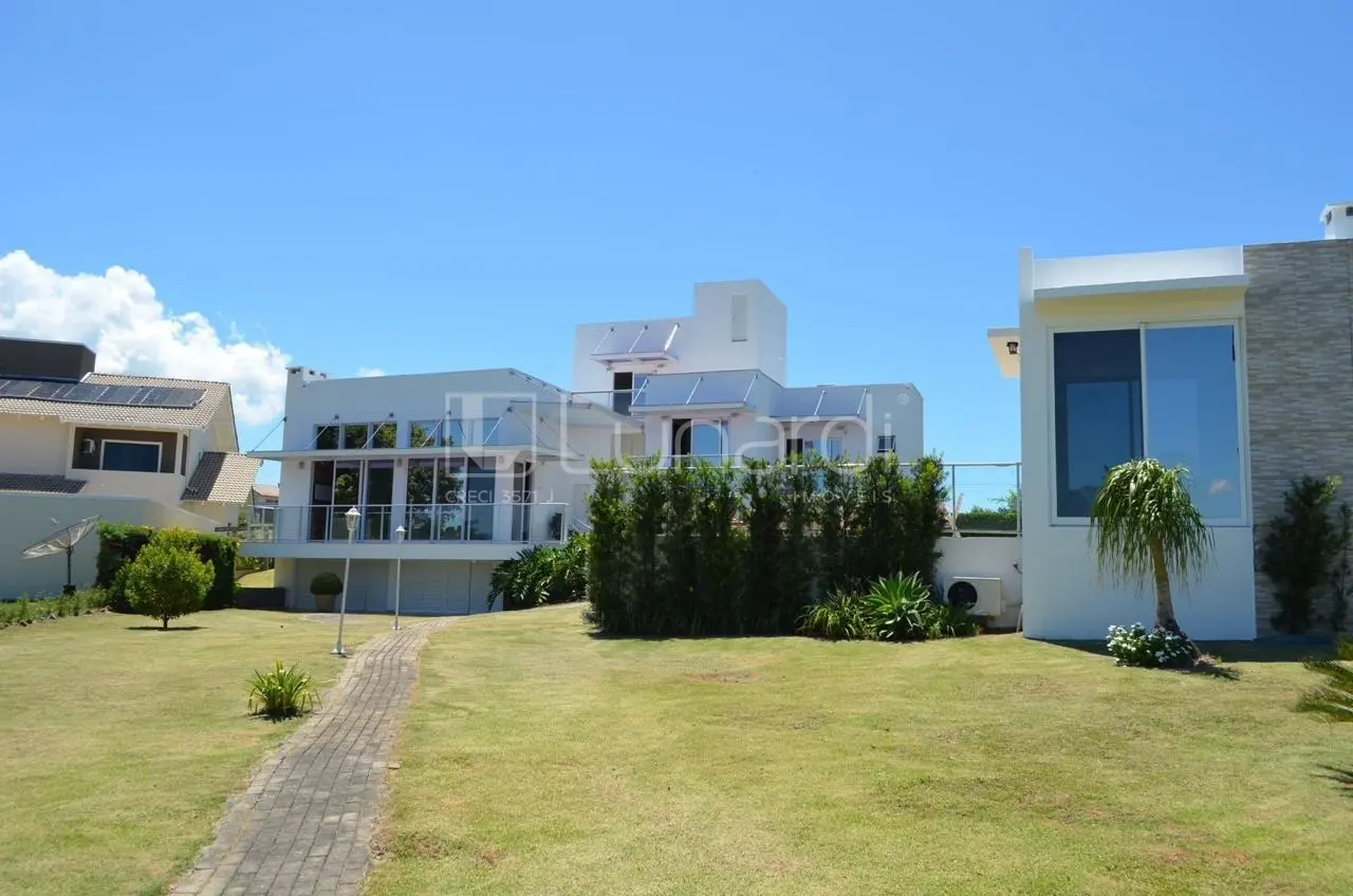 Foto Casa com 4 Dormitórios