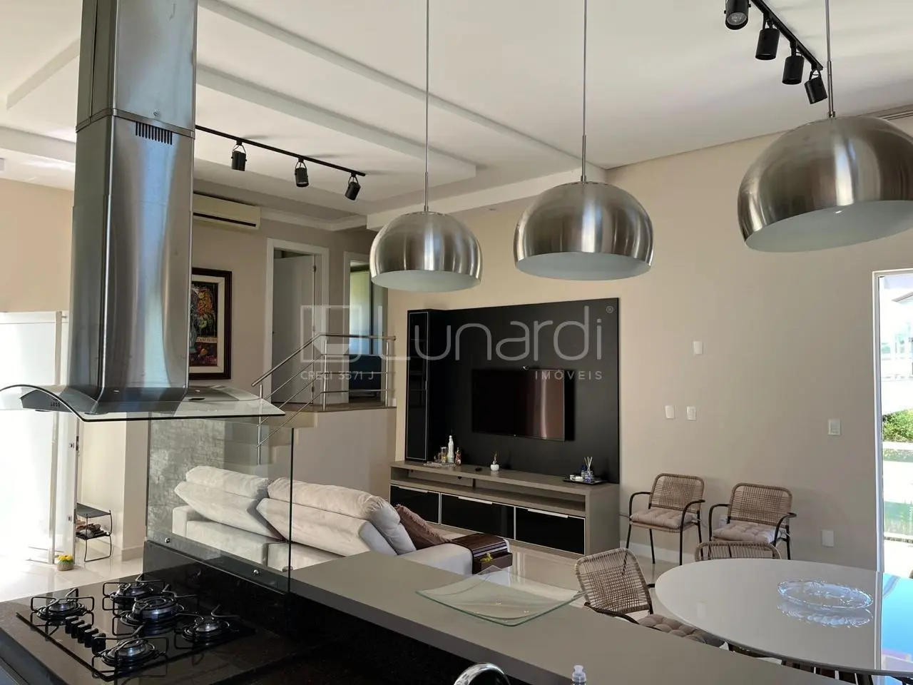 Foto Casa com 4 Dormitórios