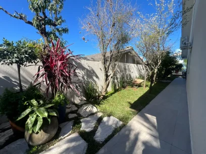 Foto Casa com 3 Dormitórios