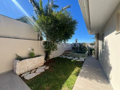 Foto Casa com 3 Dormitórios
